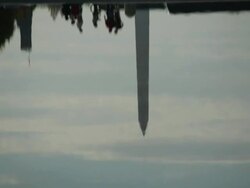 WS TU View of Washington monument with traffic and reflection in water / Washington, District of Columbia, United States Stock Footage