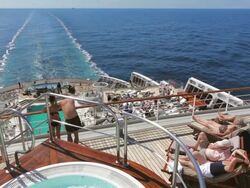 MS POV Shot of People resting and swimming on Cruise ship Queen Mary 2 / Stavanger, Rogaland, Norway Stock Footage