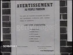 1942: OCCUPIED FRANCE: WS People standing outside reading posted bulletin. MS Paper w/ names of executed people, various reasons. Men standing on sidewalk reading postings, possibly papers. Two men talking outside, one placing hand on shoulder. Instructional Video