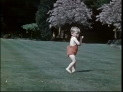 Toddler running around, plus mother, 1951 Stock Footage