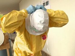 Health care trainees learn to safely remove PPEs Stock Footage