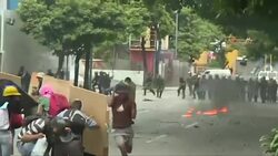 CLEAN : Police demonstrators clash in demo during strike in Caracas News Clip