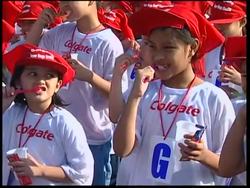 Students stage simultaneous teeth brush in world record attempt News Clip