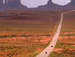 TU view of Monument Valley looking south on US Route 163 from north of the Arizona Utah State line / Mexican Hat, Utah, USA Stock Footage