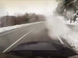 Car Onboard Camera: driving in a snow storm Stock Footage