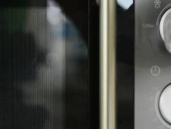 Cooking using a microwave Stock Footage