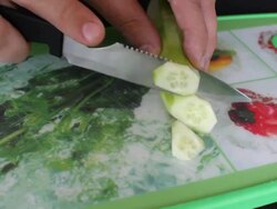 Chopping cucumber Stock Footage