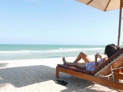 HD Woman using mobile phone on the beach Stock Footage
