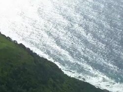 WS AERIAL ZI View of paragliding over cliff / Stanwell Park, Sydney New South Wales, Australia Stock Footage