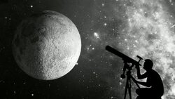 Man looks at the moon through a telescope Stock Footage