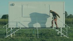 Man in red dress knocking at the booth, funny, joke, strange Stock Footage