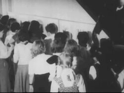 Children look at train and walk through gallery Stock Footage