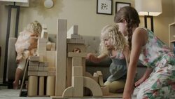 Medium low angle view of girls playing on floor with building blocks / Orem, Utah, United States Stock Footage