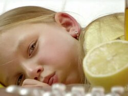 Little girl lying sick in her bed, coughing. Stock Footage