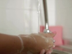 female hands washing with soap and water Stock Footage