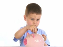 Boy With A Piggy Bank Stock Footage