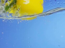 Bell Pepper Splashing Into Water (Super Slow Motion) Stock Footage