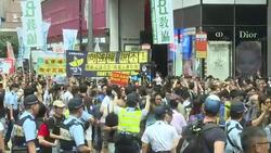 CLEAN : Hong Kong bookseller defies Beijing by leading protest News Clip