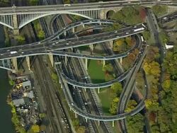 AERIAL MS Traffic on Alexander Hamilton Bridge and Cross Bronx Expressway / New York City, New York, USA Stock Footage