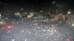 CLEAN : Tahrir Square protesters let off fireworks News Clip