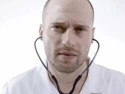 Doctor examines Stock Footage