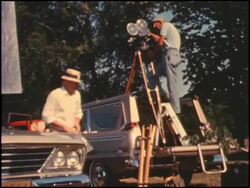 Movie crew films Studebaker car commercial Stock Footage