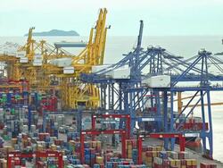 Container Cargo freight ship with working crane bridge in shipyard Stock Footage