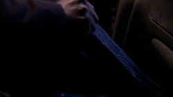 A stranded motorist tries to put on a pair of frozen jeans. Stock Footage