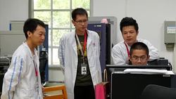 Huawei engineers working with computers News Clip