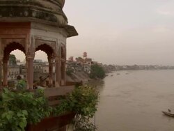 WS CS  Musicians playing sitar and tabla drums in  stone cuppola over Ganges river / India Stock Footage