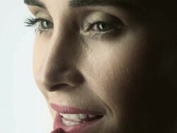 Young woman applying lipstick Stock Footage