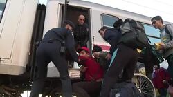 CLEAN : Migrants in Croatia board train for Slovenia border News Clip