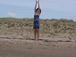 Beach Yoga: Stretches Up and Namaste Stock Footage