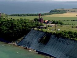  AERAIL MS View of lighthouse near ocean / Hiddensee, Mecklenburg-Vorpommern, Germany Stock Footage