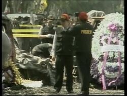 WRAP Scene of blast, wreath-laying, officials, morgue, tourists News Clip