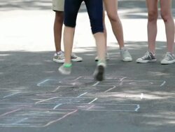 MS TU PAN Girls playing hopscotch / Summit, New Jersey, United States Stock Footage