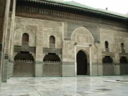 MS PAN Shot of ornate courtyard in Madrasa Bou Inania / Fez, Fes-Boulemane, Morocco Stock Footage