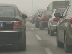 Driving shot through smoggy Beijing News Clip