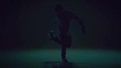 young male soccer freestyler is doing kick-ups. Stock Footage