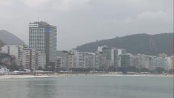 Rio de Janeiro beach and city skyline News Clip