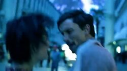 Young couple dance closely under strobing lights and collapse into each other's arms as the lights go out Stock Footage