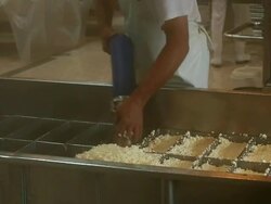 Cheesemaker Filling Cheese Curds in Moulds Stock Footage