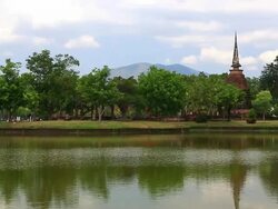 Temple with its reflection in Sukhothai historical park Thailand Stock Footage