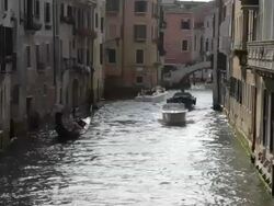 WS LD Boats Going down Canal / Venice, Italy Stock Footage