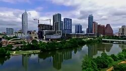 Perfect Mirror Reflection of Austin Texas Town Lake Aerial View flying away from City Stock Footage