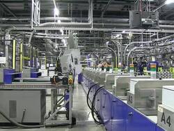 MS Shot of worker working at newspaper printing office / Russelheim, Hesse, Germany Stock Footage