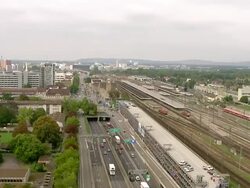 WS AERIAL View of Kleinbasel district in city of basel with train station badischer bahnhof and schwarzwaldstrasse road / Wadenswil, Zurich, Switzerland Stock Footage