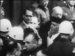 B/W 1946 Nazis Hess + von Ribbentrop in courtroom at war crimes trials / Nuremberg / newsreel Stock Footage