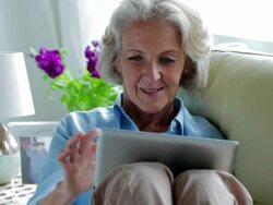 Senior tablet sofa         LI CM BU RE Stock Footage