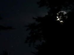 Time lapse of the crescent moon with its earthshine close to the Pleiades stars cluster Stock Footage